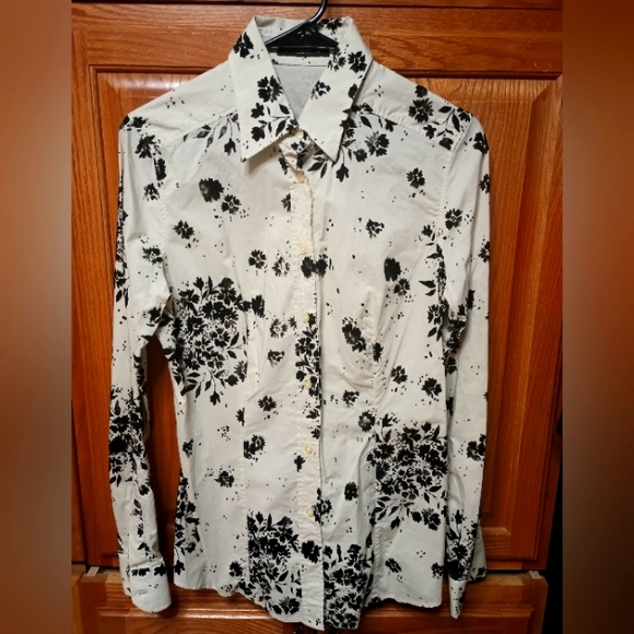 A floral design button down shirt by etro made in Italy